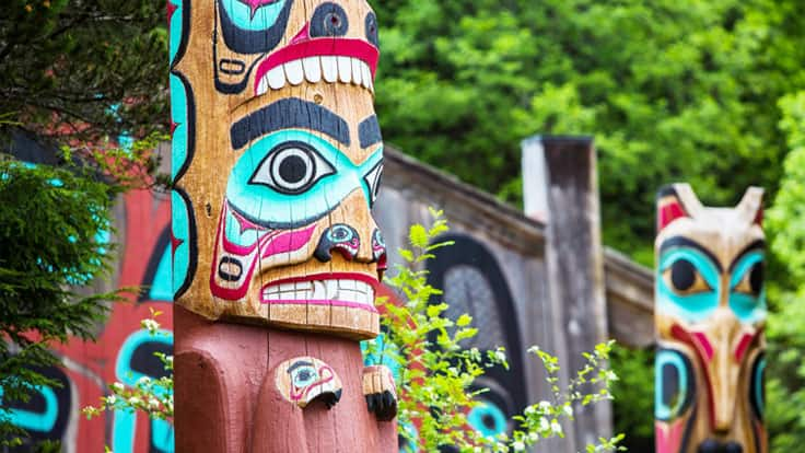 Discover native tribes totem pole carvings while on an Alaskan cruise shore excursion.