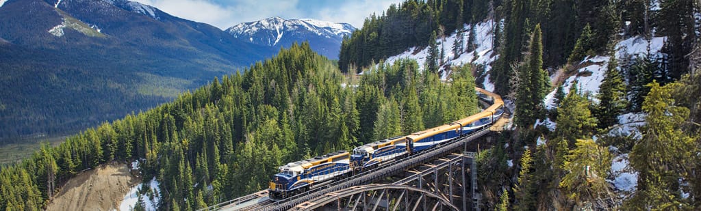 Journey on the Rocky Mountaineer through the rugged terrain of the Canadian Rockies with a pre or post cruise land program to the Great Land.