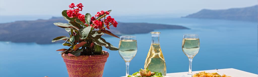 Eat, drink, and dine in Santorini when you travel on Oceania Cruises to tour the Greek Islands of the Aegean Sea for vacation.