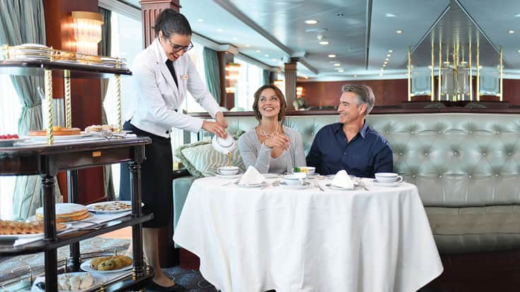 Couple enjoying afternoon tea on board Sirena