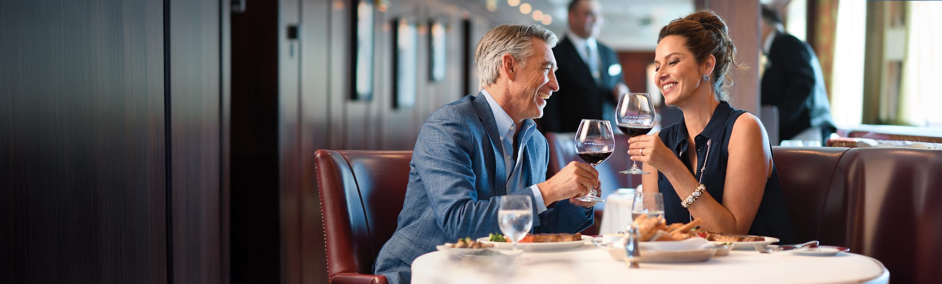 Your World Included, couple having dinner and wine at a free specialty dining restaurant